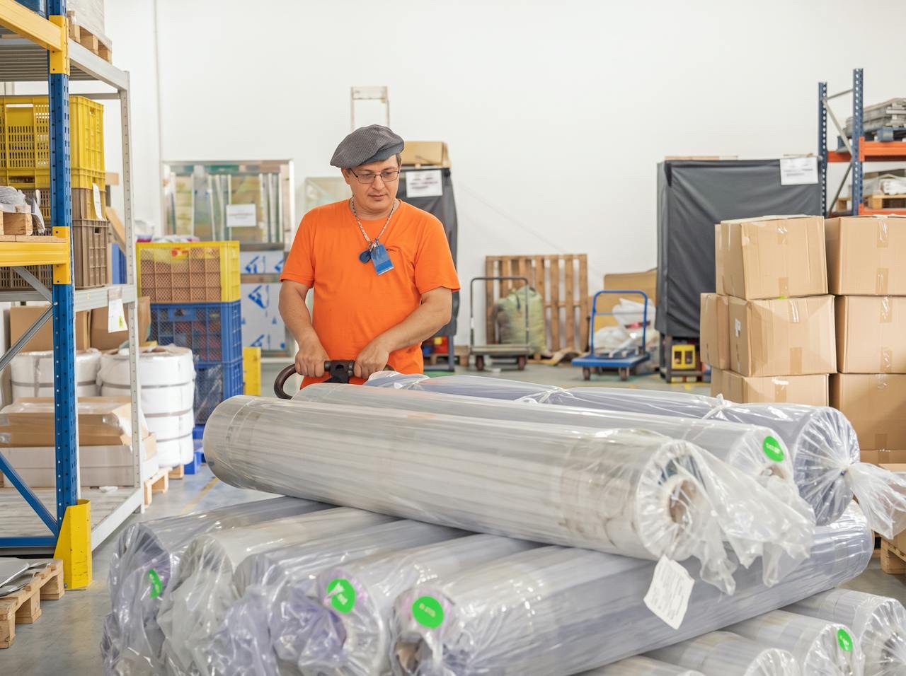 Materials procurement — rolls of fabric received in the ROOTSMEN warehouse